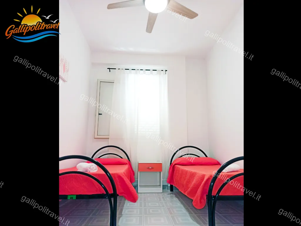 Bedroom with single beds de La Praja, Baia Verde Gallipoli
