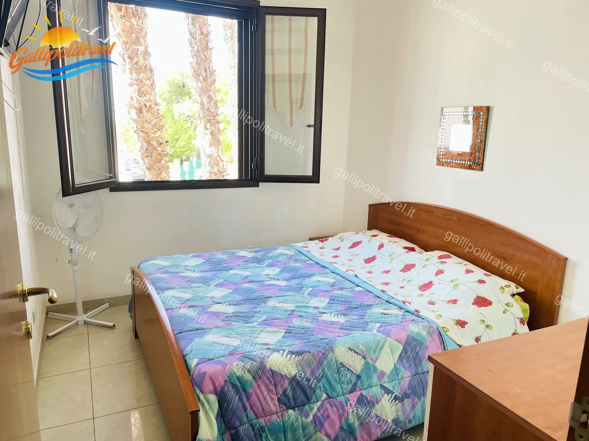 Double room with palm tree view of the three-room apartment Orange, Baia Verde Gallipoli